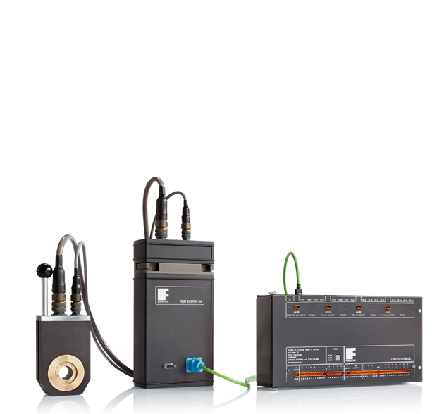 Non-destructive eddy current testing of long products with DEFECTOMAT